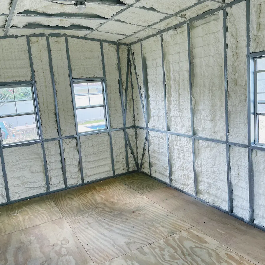 Closed-cell spray foam insulation applied to wall cavities in a residential project in Valley
